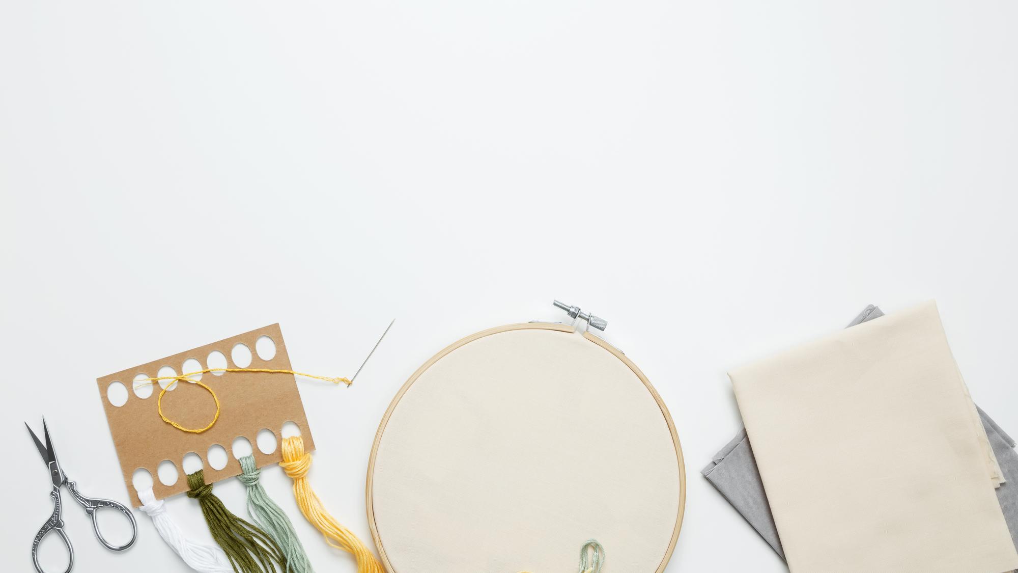 arranged embroidered samples and thread palette